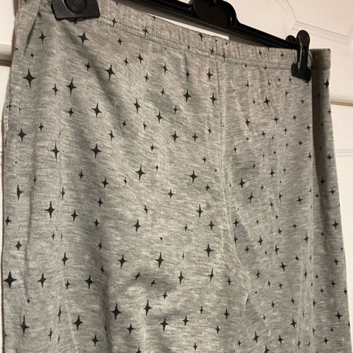 Gray pajama pants with black stars like new, size M-L