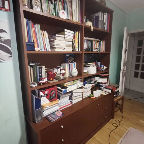 Bookcase like new with storage drawers and cabinets