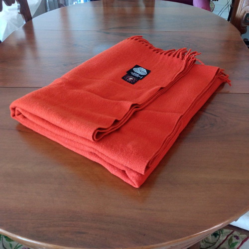 Wool blanket like new, solid brick red color