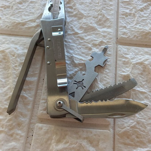 Pocket multitool used, stainless steel with case
