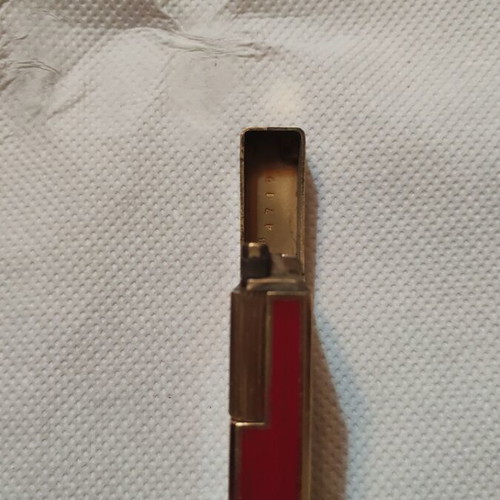 S.T.Dupont lighter like new, gold and red, refillable gas
