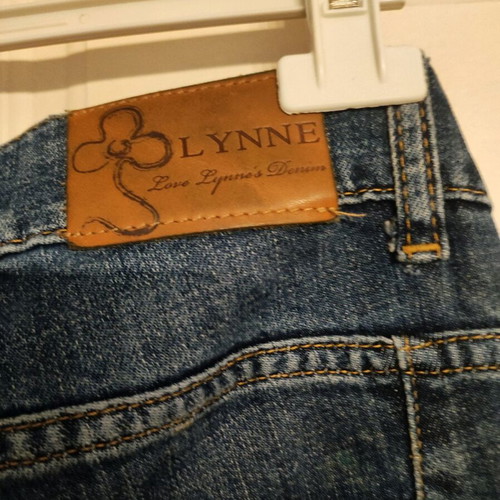 Lynne women's jeans like new with animal print and patches, size L