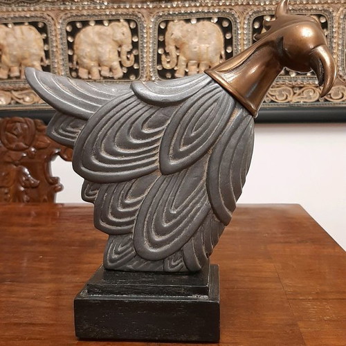 Decorative bird used with metal head and wooden base