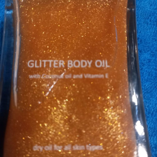 Glitter body oil new with coconut oil and vitamin E