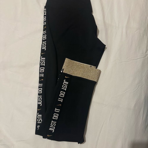 Nike women's 3/4 leggings used with gold details size S