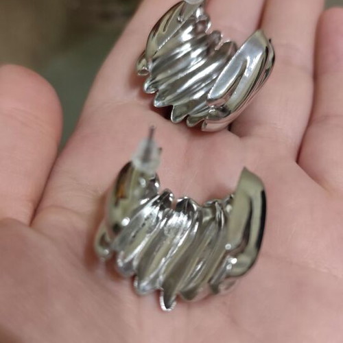 Impressive silver earrings new, iron and titanium steel