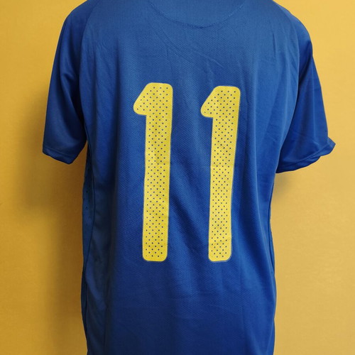 Brazil football jersey used, size M, with black ink stain