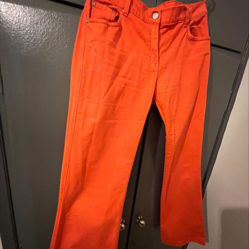 Orange pants like new made of Italian fabric