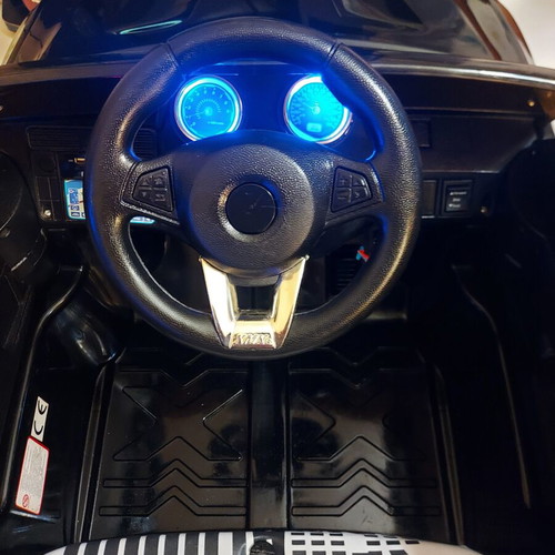 BMW X6 electric ride-on car like new with remote control and LED lights