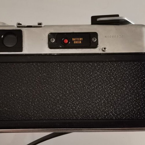 Yashica GSN Electro 35 camera used with Yashinon DX 45mm f/1.7 lens, case, and 2 flashes