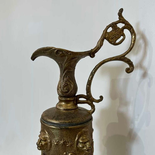Vintage bronze decorative pitcher with baroque reliefs