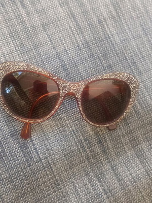 Vintage sunglasses used with rhinestones and charm