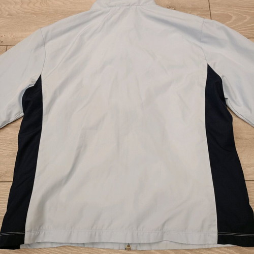 Vintage Nike windbreaker jacket used in ice blue with dark navy details