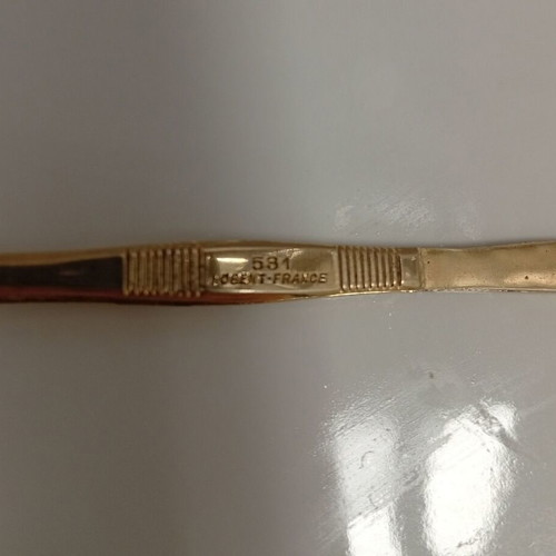 French vintage tweezers used, likely gold-plated from Nogent