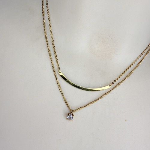 Double women's necklace in gold color with metal detail and small diamond, like new