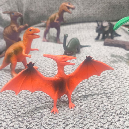 Dinosaur figure set like new, 9 figures with trees and sticks