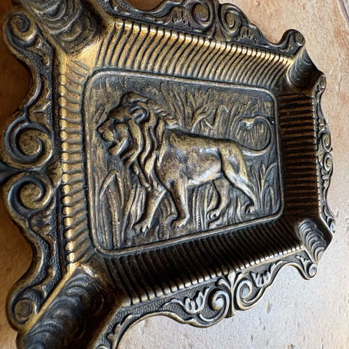 Vintage brass ashtray with lion carving, like new