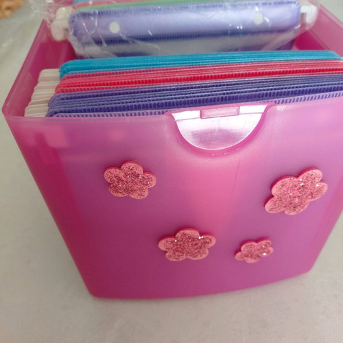 CD storage box with colorful sleeves like new