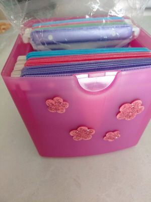 CD storage box with colorful sleeves like new
