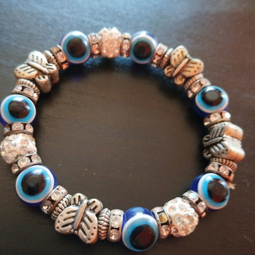 Bracelet with blue evil eye beads used