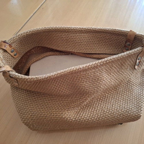 Woven magazine holder with wheels used