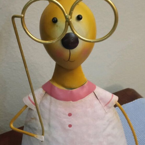 Metal rabbit and 10 hand-painted wooden eggs like new