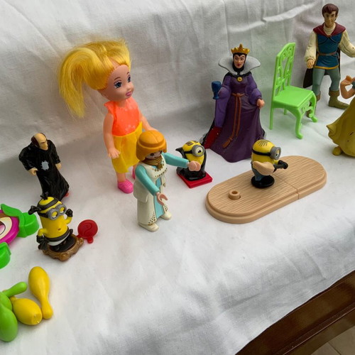 Miniature toys used, old and new figures set