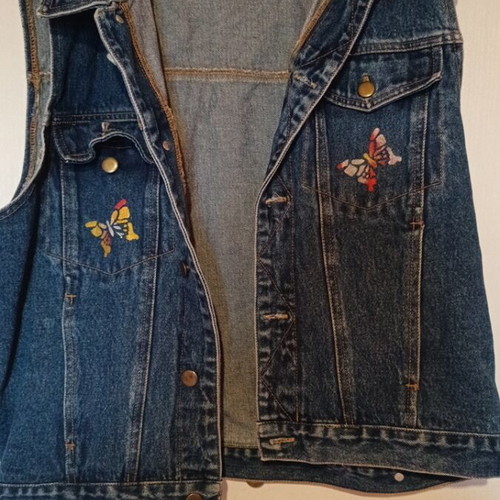 Women's denim vest with butterfly print, size M, like new