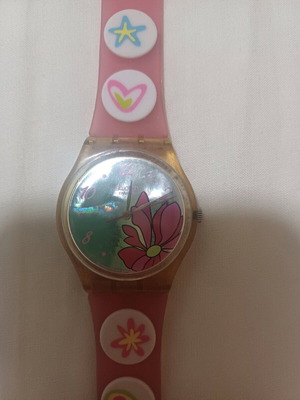 Swatch wristwatch used, older model, pink strap