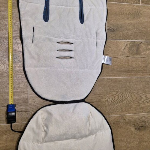 Baby footmuff used, warm with slots for straps