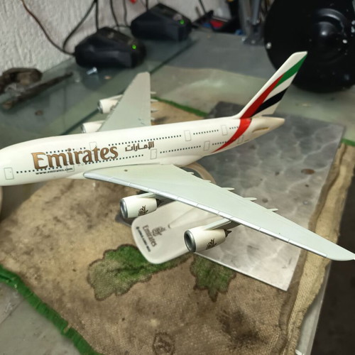 Emirates A380-800 model plane used with missing two rear wings