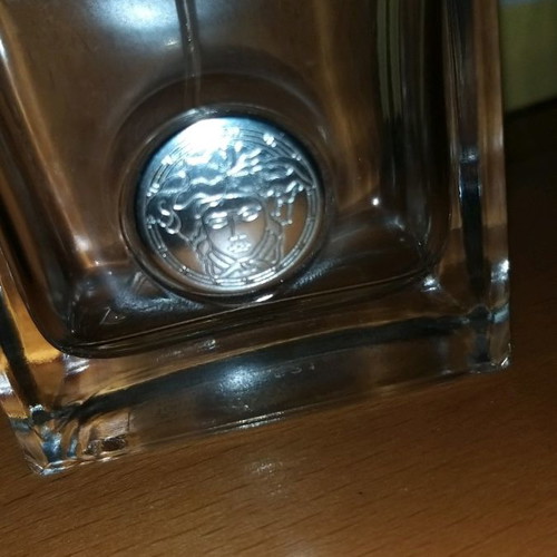 Empty Versense perfume bottle by Versace