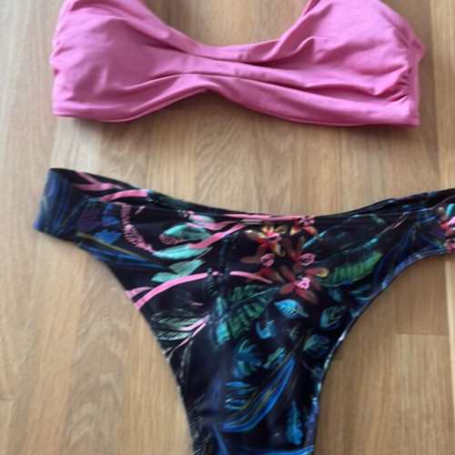 Bikini small sugar free top and funky Buddha bottom like new, black and pink