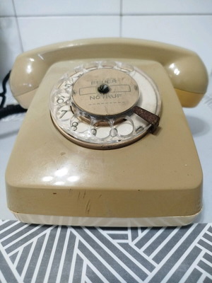 Vintage telephone used, beige, wired, home phone