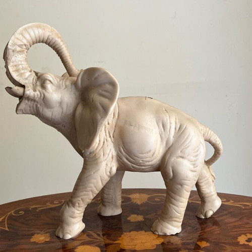Elephant statue and lion ashtray used