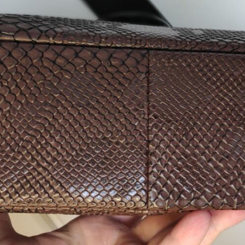 Christina Malle shoulder bag like new, embossed brown