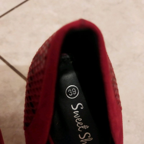 Red leather pumps used, size 39