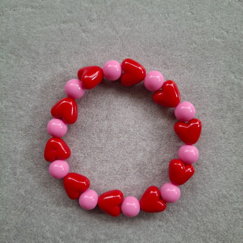 Handmade bracelet with red and pink heart beads new