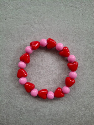 Handmade bracelet with red and pink heart beads new