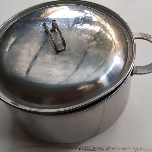 Cookware set used with pot, steamer, sieve, and colander