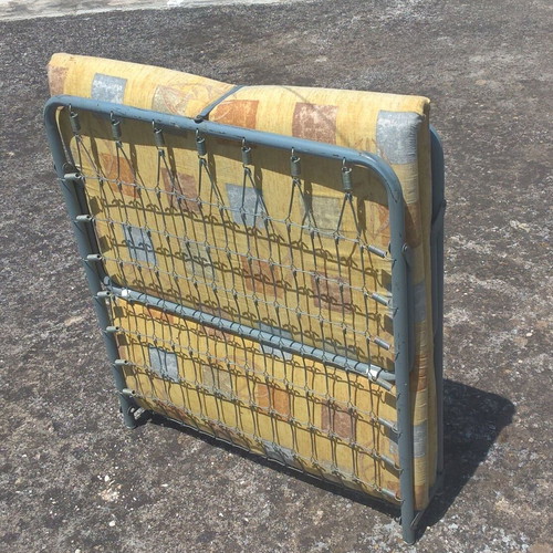 Metal folding bed with mattress used, sturdy and comfortable