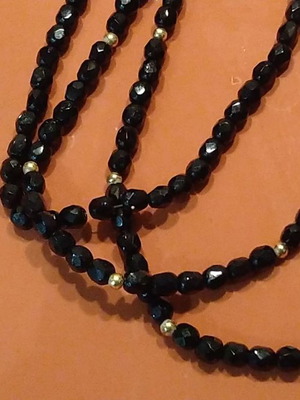 Vintage necklace with glass beads in three strands