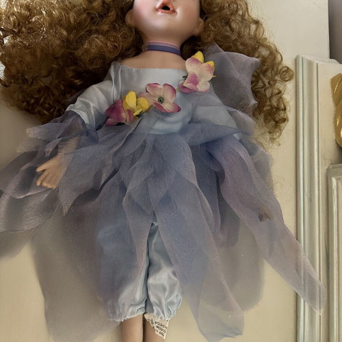 Porcelain doll fairy like new