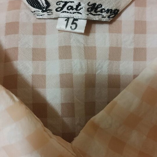 Yellow semi-transparent shirt with patterned buttons new