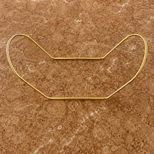 Metal serving bowl with gold handles