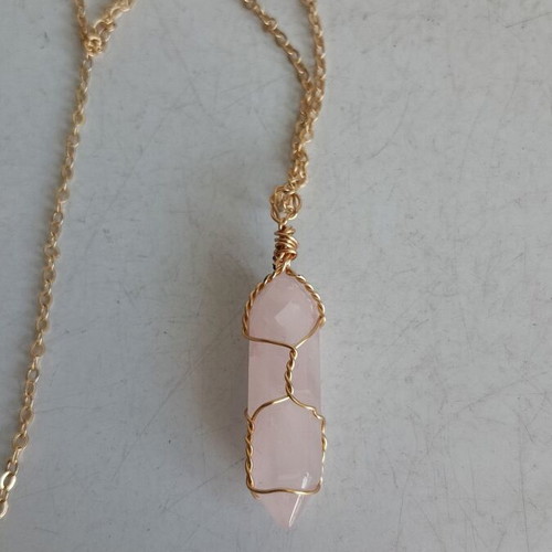 Jewelry set with rose quartz and gold-tone metal elements
