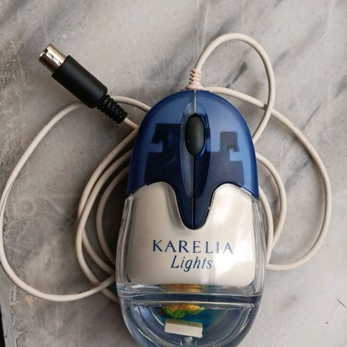 Wired optical computer mouse used with Karelia Lights advertising theme