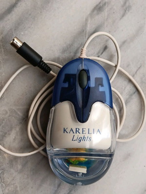 Wired optical computer mouse used with Karelia Lights advertising theme