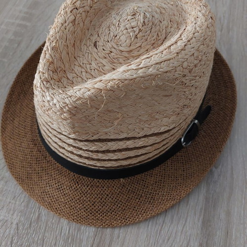 Straw hat like new with black strap, one size