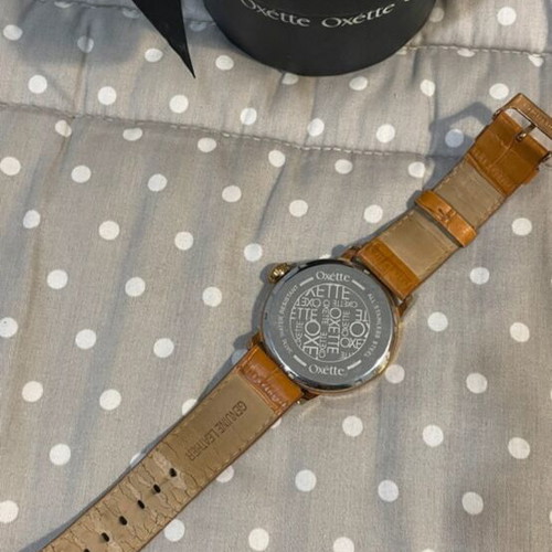 Oxette wristwatch used, brown leather strap, gold details
